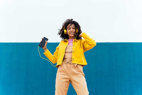 Women listening to music with cell phone