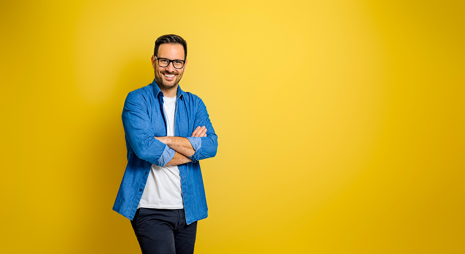Man with yellow background
